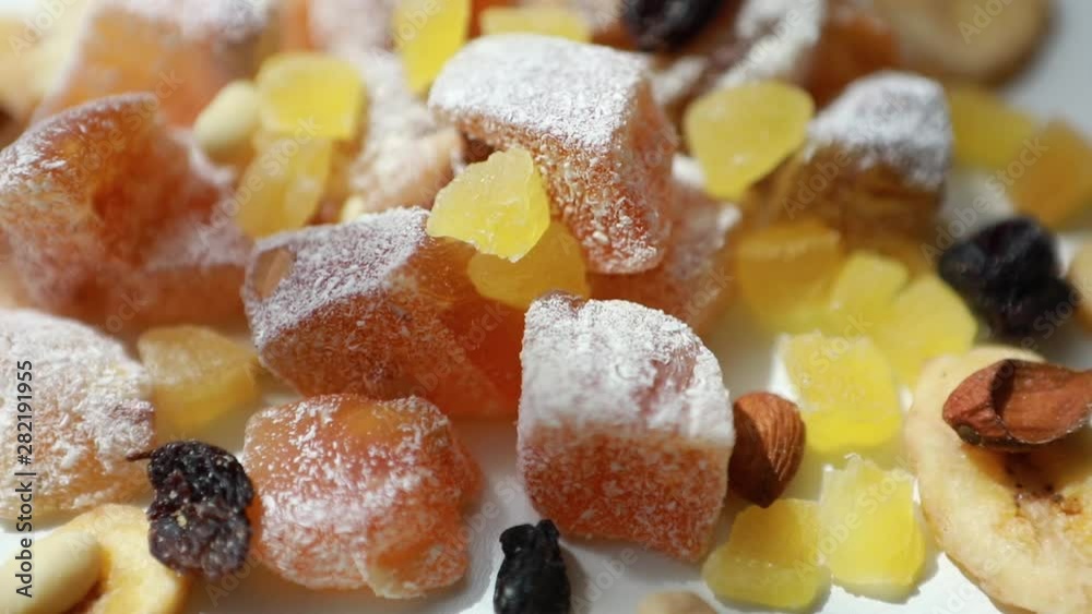 Turkish delight, nuts, dried fruits are mixed on the table