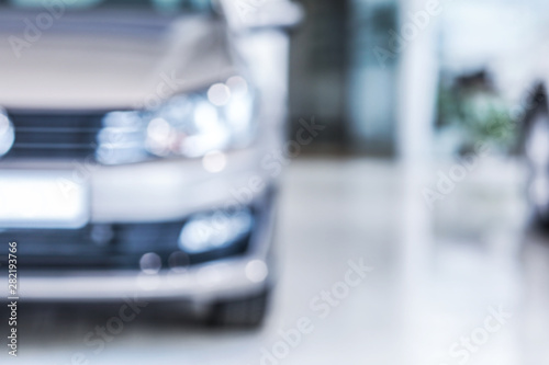 Modern car in showroom, blurred view © Pixel-Shot