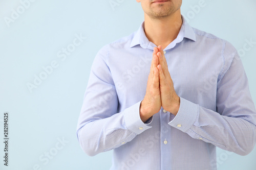 Religious man praying to Go...