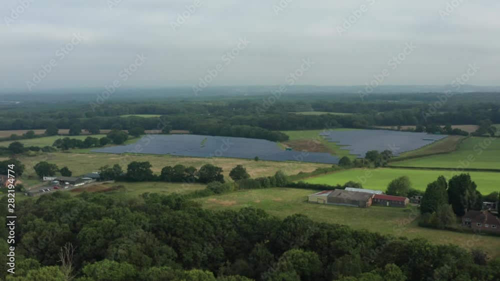 Solar farm in the British countryside aerial Solar farm in the British countryside aerial
