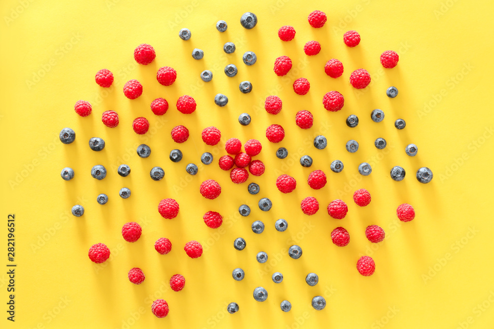 Tasty ripe berries on color background Tasty ripe berries on color background