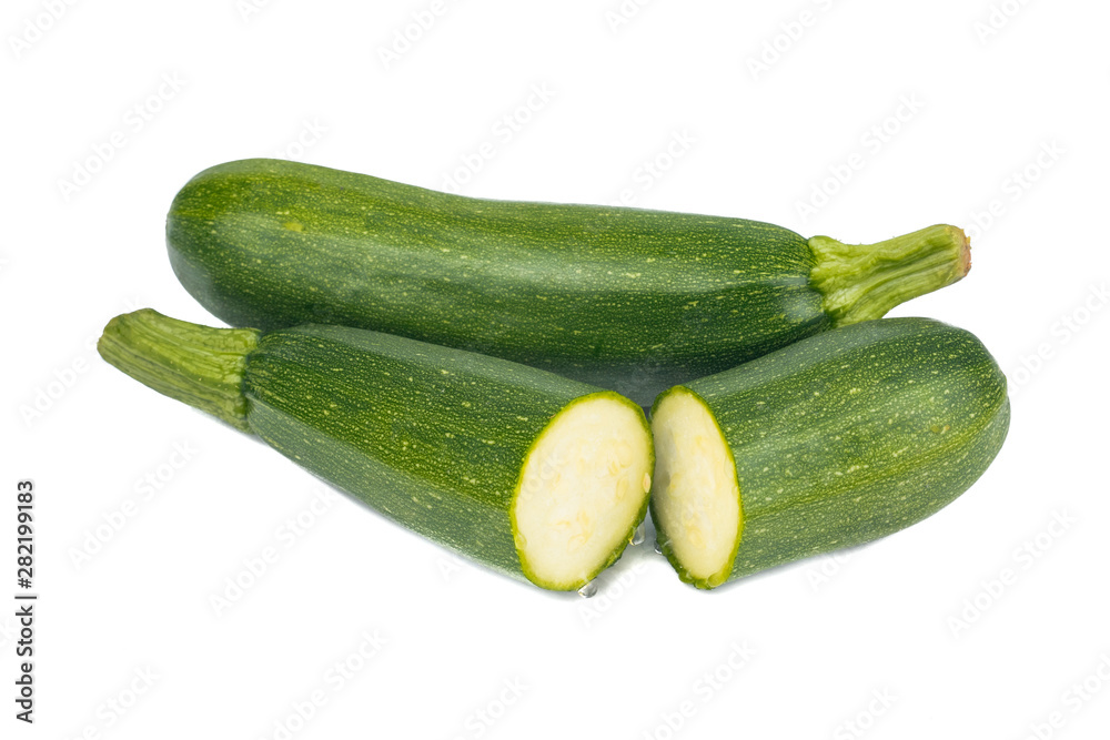 Fresh green Zucchini (Cucurbita pepo var. cylindrica) isolated on white background Fresh green Zucchini (Cucurbita pepo var. cylindrica) isolated on white background