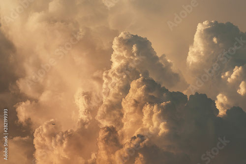 dramatic cumulonimbus cloud at sunset photo