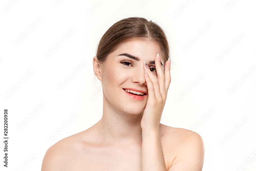Close-up portrait of a beautiful young girl with holding hands near face isolated over white background. Close-up portrait of a beautiful young girl with holding hands near face isolated over white background.