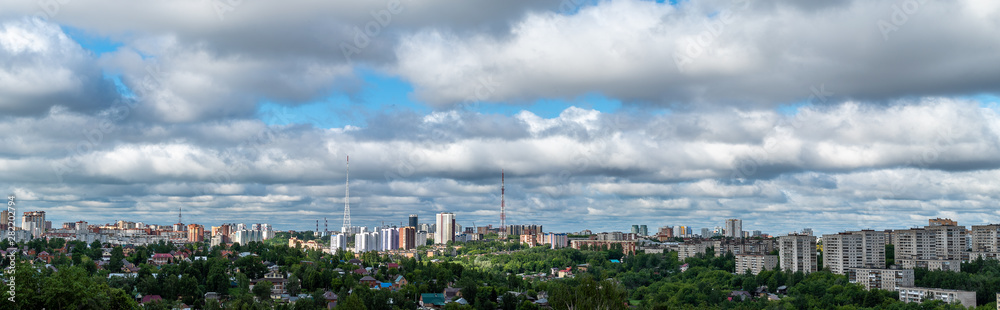 Before us is a panorama of the Central part of Motovilikha district of Perm. Summer morning, low Cumulus clouds. June