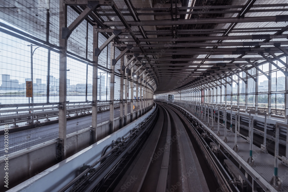 tunnel of monorail road view from front window of a moving train running tunnel of monorail road view from front window of a moving train running