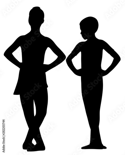 Ballet dancers girl and boy standing with crossed legs
