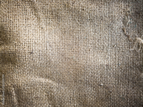 Close-up fabric linen texture, sackcloth nature texture.Brown background.