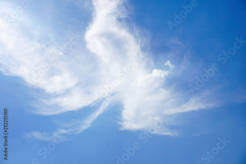 Clear blue sky with white cloud background in sunshine day