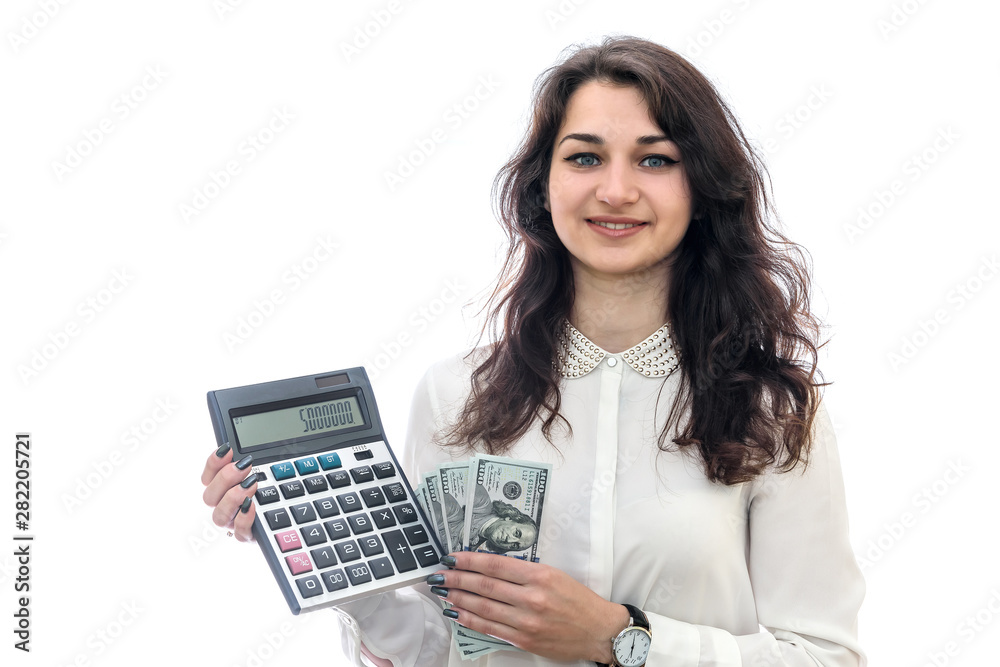 Woman holding dollar banknotes and calculator isolated on white Woman holding dollar banknotes and calculator isolated on white