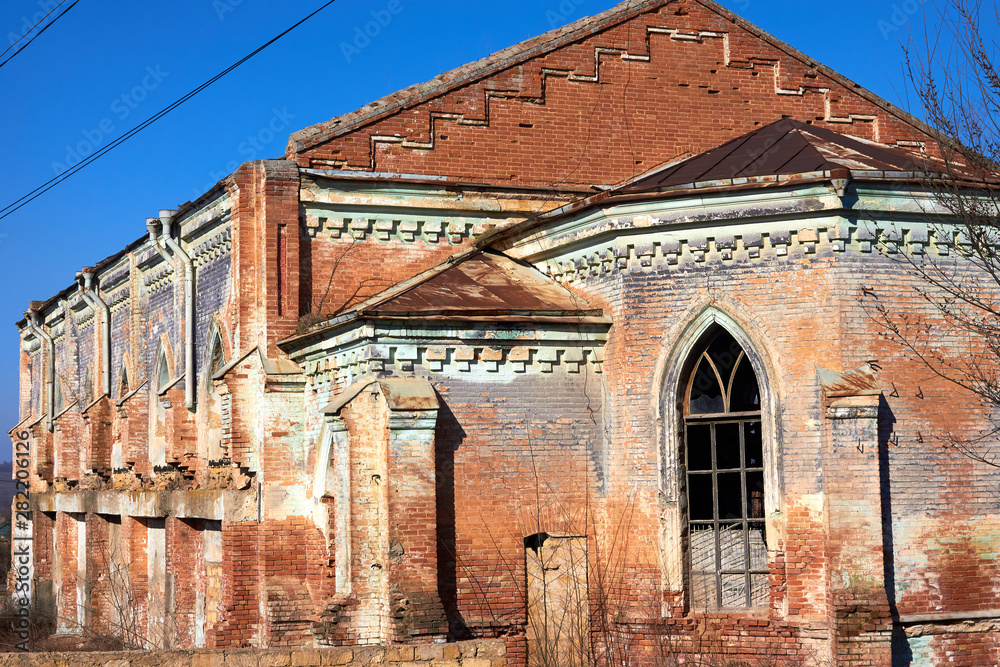 Ruins of ancient Lutheran church in Ukraine. Historic building in 1905 built first German settlers destroyed by vandals of proletariat during revolution in Russia in 20th century.
