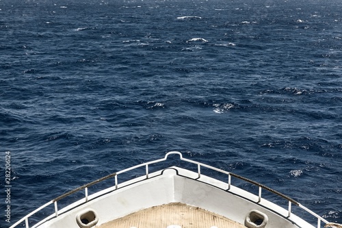 Boat heading towards the horizon