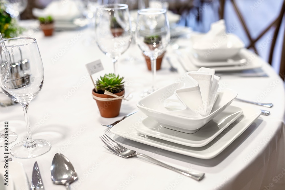 Fototapeta premium Plates and dishes on dining table
