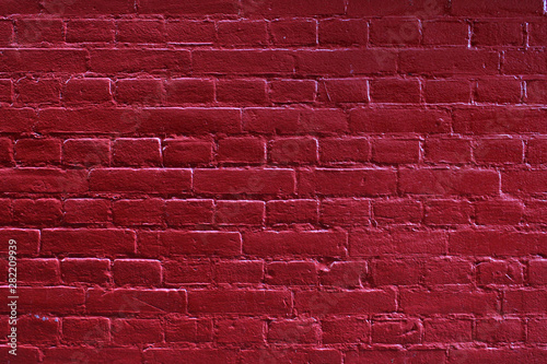 Dark red painted clean brick wall detailed background texture