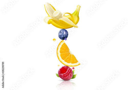 A stack of fresh ripe fruits and berries isolated on white background. Raspberry, orange, blueberry, banana fruit stack in a row. Healthy life, balanced diet food composition design elements concept