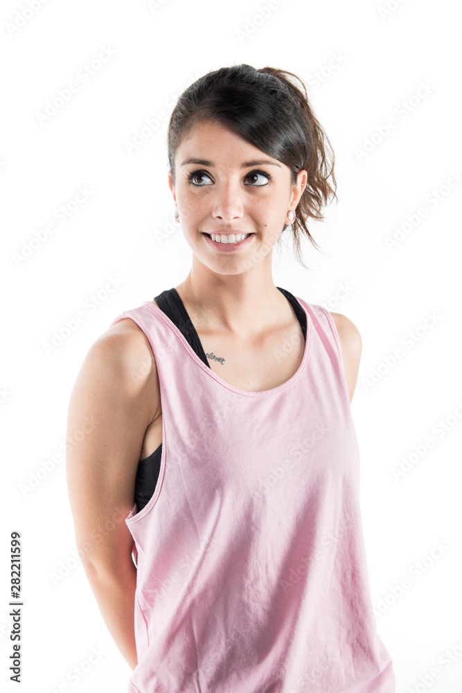 Young woman portrait wearing sport wear on a white background studio shoot Young woman portrait wearing sport wear on a white background studio shoot