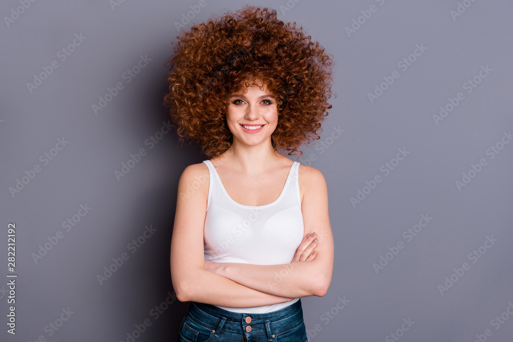 Portrait of attractive lady youth looking feel glad wear singlet denim jeans isolated over grey background Portrait of attractive lady youth looking feel glad wear singlet denim jeans isolated over grey background