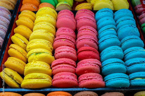 Tray of colorful macaron for sale at patisserie