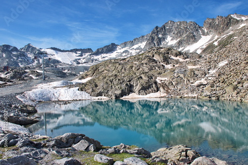 Fototapeta Naklejka Na Ścianę i Meble -  Scenic view of glacial lake in Brenta Dolomites with beautiful reflection of the rocks