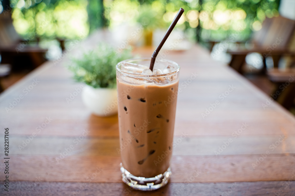 Iced Cocoa in the glass with straw Iced Cocoa in the glass with straw