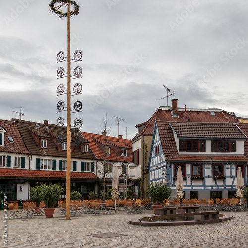 Sindelfingen, Baden Wurttemberg/Germany - May 11, 2019: Street Scenario of Central District Square, Wettbachplatz with traditiona house facades. photo