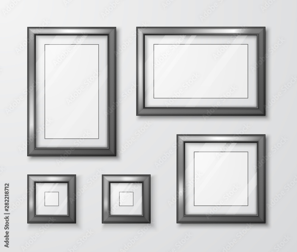 Photo Frames on gray wall. Modern empty frame template with transparent glass and shadow. Vector illustration Photo Frames on gray wall. Modern empty frame template with transparent glass and shadow. Vector illustration