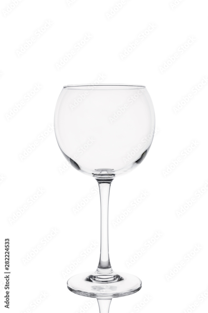 Belarus, Minsk. July 1, 2019. Isolated Martini ballon glass with reflection on white background