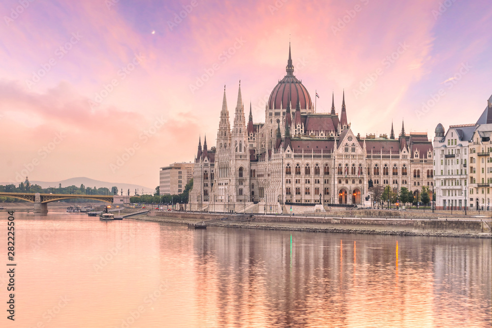 Parliament building over delta of Danube river in Budapest