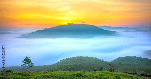 Dawn on the mountain plateau mist covered valley in Da Lat  Vietnam. All create wonderful views in the morning of the beautiful new day