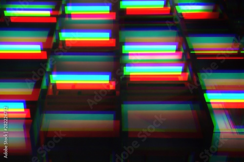 Abstract colored neon lights. Tech Seamless Texture with Neon Rays and Stripes.