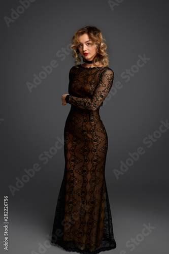 Fotografie, Obraz Beautiful female in lace evening dress