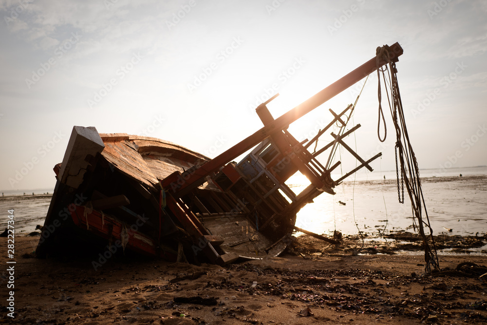 Fishing boat on the sea, .Fishing village at sunset Fishing boat on the sea, .Fishing village at sunset