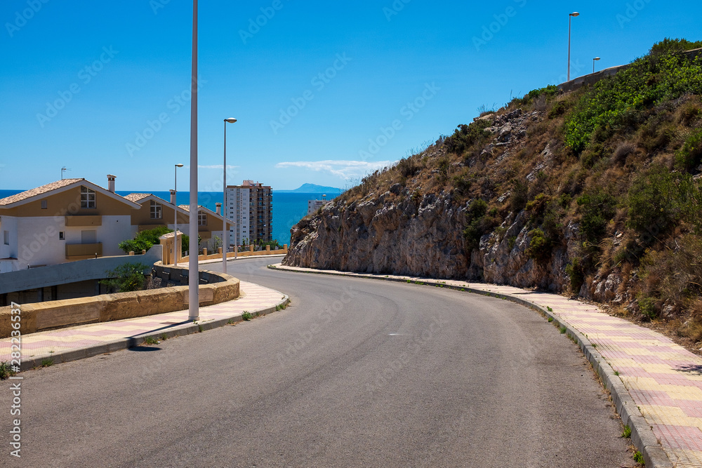 Fototapeta premium Small winding road in Cullera, Spain