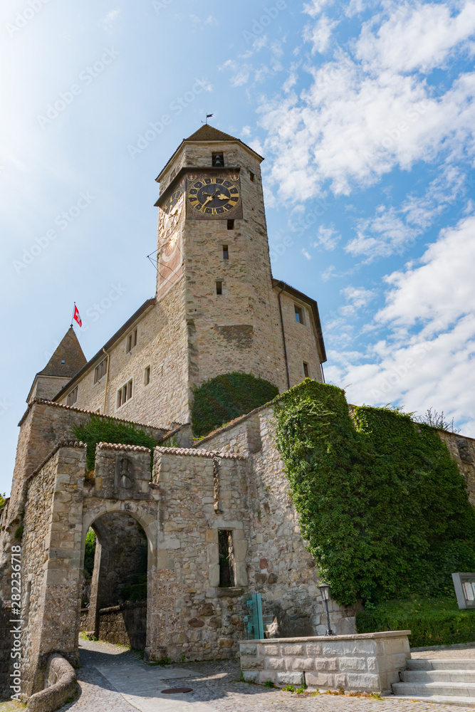 view of the medieval castle and clock tower in Rapperswil