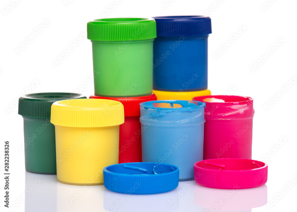 Set of Colorful Gouache jars isolated on white background with copy space. Cans of different colors gouache paints. Set of Colorful Gouache jars isolated on white background with copy space. Cans of different colors gouache paints.