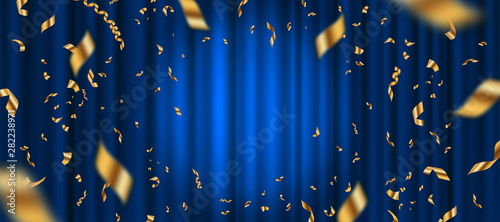 Leinwand Poster Spotlight on blue curtain background and falling golden confetti
