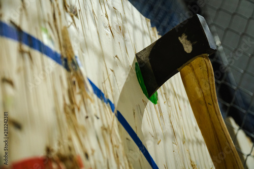 Axe stick on the bullseye target in Throwing axe new trend sport