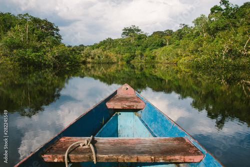 Canoeing through the flooded Amazon Jungle photo