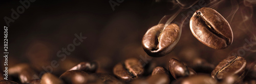 Fényképezés Coffee Beans Closeup On Dark Background