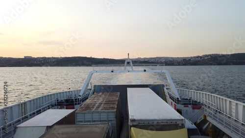 Yalova, Turkey - July 2019: Back of a ferry at sea carrying cars and trucks, leaving Eskihisar heading to Yalova port on a summer afternoon