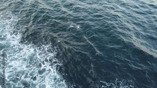Yalova, Turkey - July 2019: White waves caused by the ship on a summer afternoon