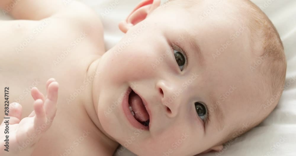 Closeup view of adorable little child on bed Closeup view of adorable little child on bed