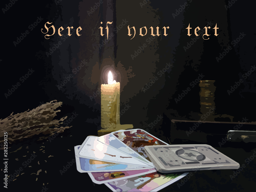 divination by the tarot cards at night by candlelight
