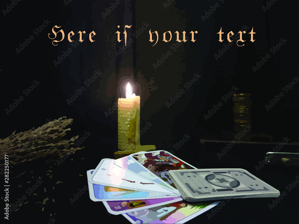 divination by the tarot cards at night by candlelight