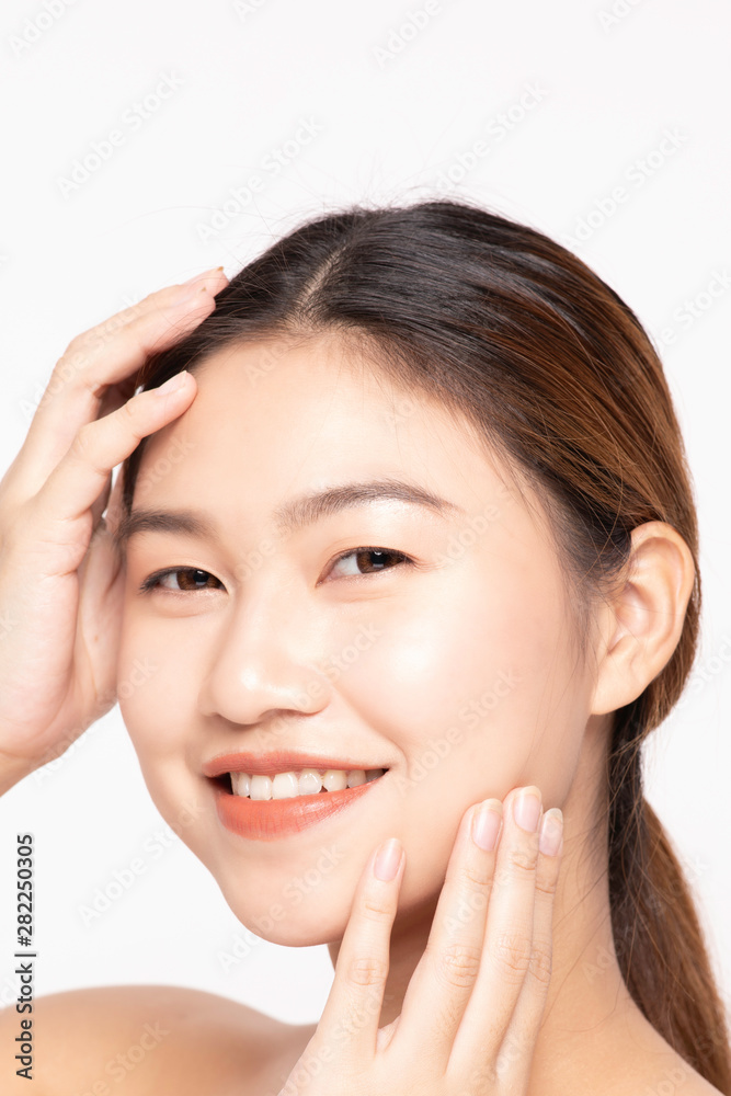 Attractive Charming Asian young woman smile with white teeth and touching soft cheek feeling so happy and cheerful with healthy Clean and Fresh Skin,isolated on white,Beauty Cosmetology Concept Attractive Charming Asian young woman smile with white teeth and touching soft cheek feeling so happy and cheerful with healthy Clean and Fresh Skin,isolated on white,Beauty Cosmetology Concept