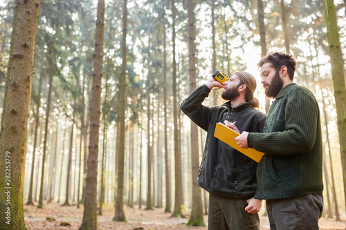 Foresters determine tree height with rangefinder