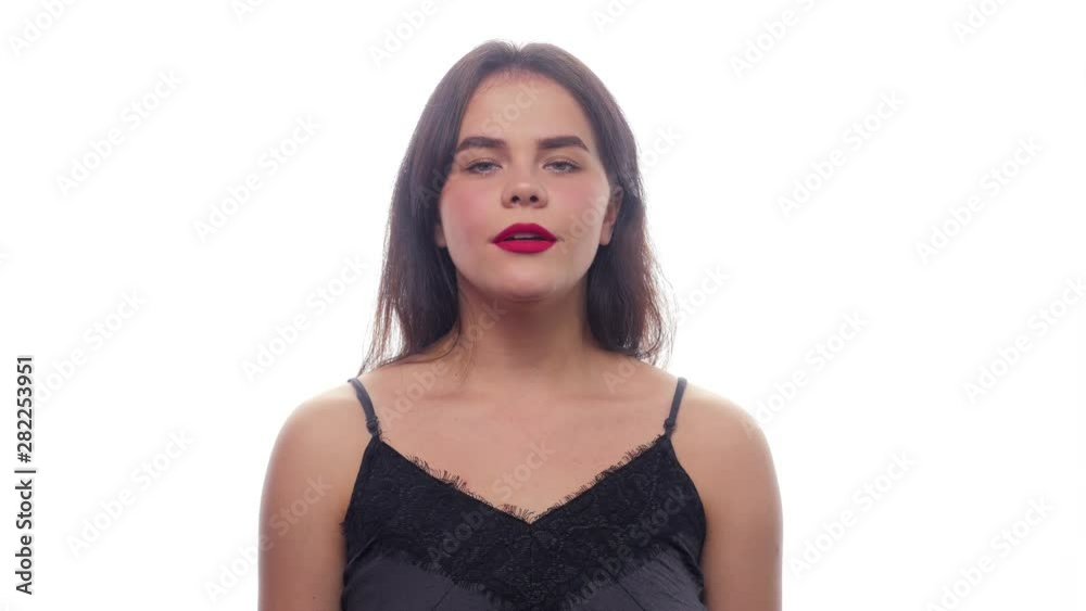 Girl breathes deeply on a white background - White background - face expressions