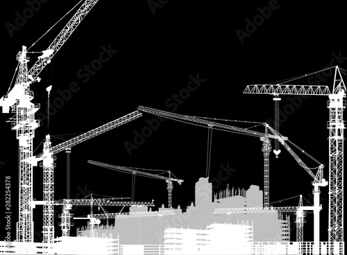 nine cranes and unfinished buildings on black