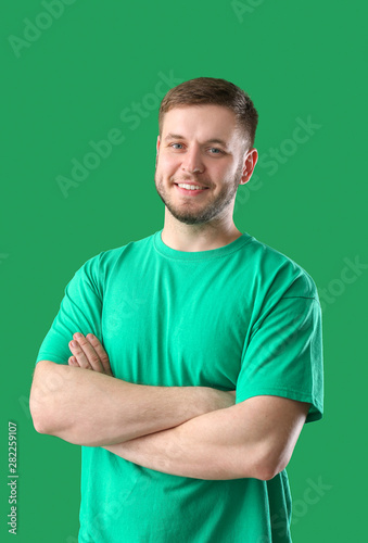 Handsome young man on color...