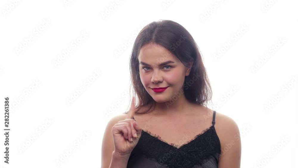 The girl playfully shows no - White background - Face Expressions The girl playfully shows no - White background - Face Expressions